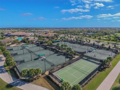 This beautiful end-unit Coach home offers breathtaking views of on Lakewood National Golf Club in Florida - for sale on GolfHomes.com, golf home, golf lot