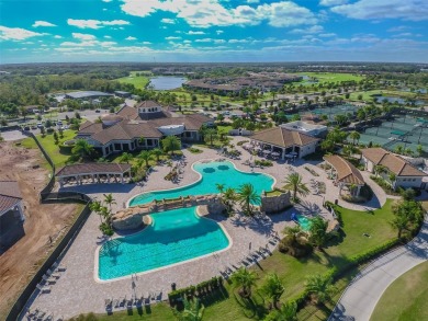 This beautiful end-unit Coach home offers breathtaking views of on Lakewood National Golf Club in Florida - for sale on GolfHomes.com, golf home, golf lot