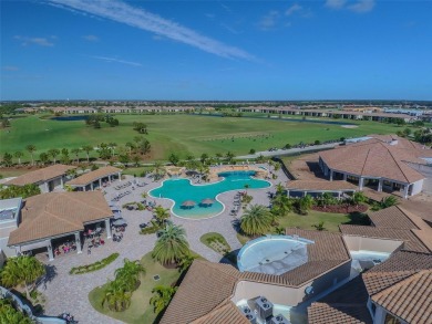 This beautiful end-unit Coach home offers breathtaking views of on Lakewood National Golf Club in Florida - for sale on GolfHomes.com, golf home, golf lot