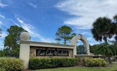 Welcome home to this well-appointed, Golf Course Front, Gated on East Lake Woodlands Country Club in Florida - for sale on GolfHomes.com, golf home, golf lot