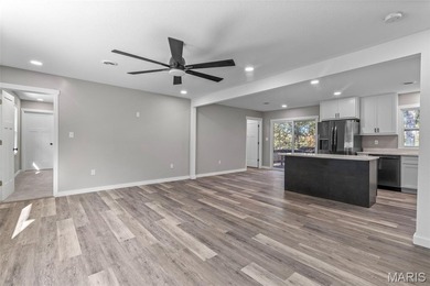Completely renovated from top to bottom, this 4-bedroom, 3-bath on Terre Du Lac Golf and Country Club in Missouri - for sale on GolfHomes.com, golf home, golf lot