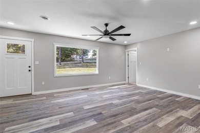 Completely renovated from top to bottom, this 4-bedroom, 3-bath on Terre Du Lac Golf and Country Club in Missouri - for sale on GolfHomes.com, golf home, golf lot