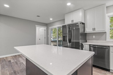 Completely renovated from top to bottom, this 4-bedroom, 3-bath on Terre Du Lac Golf and Country Club in Missouri - for sale on GolfHomes.com, golf home, golf lot