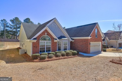 Located in the highly sought-after golf course and swim/ tennis on Canongate At Heron Bay in Georgia - for sale on GolfHomes.com, golf home, golf lot