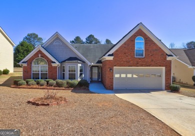 Located in the highly sought-after golf course and swim/ tennis on Canongate At Heron Bay in Georgia - for sale on GolfHomes.com, golf home, golf lot