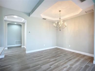 Come live a relaxing lifestyle in this Beautiful Coach Home in on Ritz-Carlton Members Golf Club in Florida - for sale on GolfHomes.com, golf home, golf lot