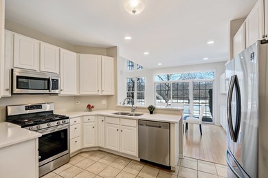 Nestled within the Fairway Club, this exceptional end unit on Edgewood Valley Country Club in Illinois - for sale on GolfHomes.com, golf home, golf lot