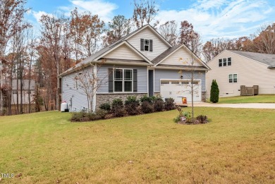 Beautiful 2-year young ranch with amazing open floor plan. This on River Golf and County Club at Lake Royale in North Carolina - for sale on GolfHomes.com, golf home, golf lot