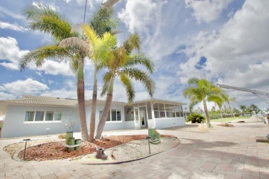 One or more photo(s) has been virtually staged. NO SHOES....NO on Gulf Harbors Golf Course in Florida - for sale on GolfHomes.com, golf home, golf lot