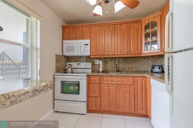 This charming 2-bedroom, 2-bathroom corner condo is in the on Oriole Golf and Tennis Club in Florida - for sale on GolfHomes.com, golf home, golf lot