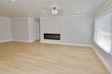One or more photo(s) has been virtually staged. NO SHOES....NO on Gulf Harbors Golf Course in Florida - for sale on GolfHomes.com, golf home, golf lot