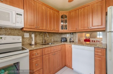 This charming 2-bedroom, 2-bathroom corner condo is in the on Oriole Golf and Tennis Club in Florida - for sale on GolfHomes.com, golf home, golf lot