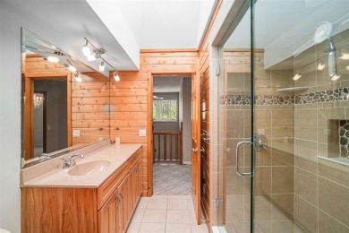 Perched at the crest of a wooded hill, this distinctive on Birchwood Farms Golf and Country Club in Michigan - for sale on GolfHomes.com, golf home, golf lot