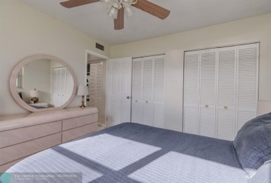 This charming 2-bedroom, 2-bathroom corner condo is in the on Oriole Golf and Tennis Club in Florida - for sale on GolfHomes.com, golf home, golf lot