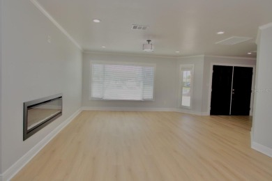 One or more photo(s) has been virtually staged. NO SHOES....NO on Gulf Harbors Golf Course in Florida - for sale on GolfHomes.com, golf home, golf lot