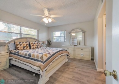 This charming 2-bedroom, 2-bathroom corner condo is in the on Oriole Golf and Tennis Club in Florida - for sale on GolfHomes.com, golf home, golf lot