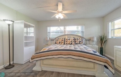 This charming 2-bedroom, 2-bathroom corner condo is in the on Oriole Golf and Tennis Club in Florida - for sale on GolfHomes.com, golf home, golf lot