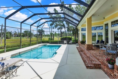 This beautiful estate home in prestigious Marsh Landing Country on Marsh Landing Country Club - Saint Johns County in Florida - for sale on GolfHomes.com, golf home, golf lot