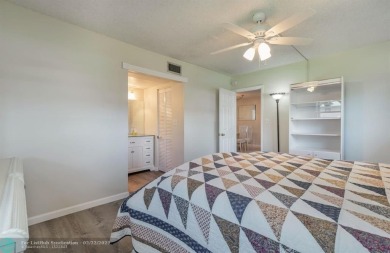 This charming 2-bedroom, 2-bathroom corner condo is in the on Oriole Golf and Tennis Club in Florida - for sale on GolfHomes.com, golf home, golf lot