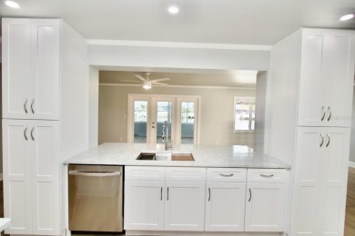 One or more photo(s) has been virtually staged. NO SHOES....NO on Gulf Harbors Golf Course in Florida - for sale on GolfHomes.com, golf home, golf lot