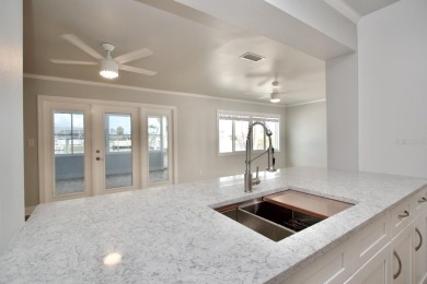 One or more photo(s) has been virtually staged. NO SHOES....NO on Gulf Harbors Golf Course in Florida - for sale on GolfHomes.com, golf home, golf lot