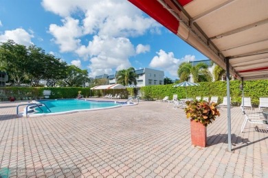 This charming 2-bedroom, 2-bathroom corner condo is in the on Oriole Golf and Tennis Club in Florida - for sale on GolfHomes.com, golf home, golf lot