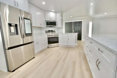 One or more photo(s) has been virtually staged. NO SHOES....NO on Gulf Harbors Golf Course in Florida - for sale on GolfHomes.com, golf home, golf lot