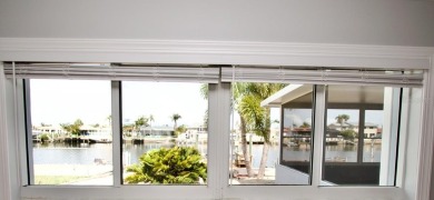 One or more photo(s) has been virtually staged. NO SHOES....NO on Gulf Harbors Golf Course in Florida - for sale on GolfHomes.com, golf home, golf lot