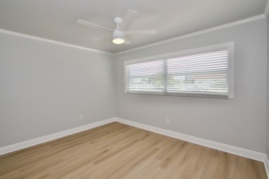 One or more photo(s) has been virtually staged. NO SHOES....NO on Gulf Harbors Golf Course in Florida - for sale on GolfHomes.com, golf home, golf lot
