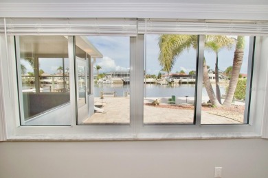One or more photo(s) has been virtually staged. NO SHOES....NO on Gulf Harbors Golf Course in Florida - for sale on GolfHomes.com, golf home, golf lot