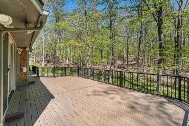 Perched at the crest of a wooded hill, this distinctive on Birchwood Farms Golf and Country Club in Michigan - for sale on GolfHomes.com, golf home, golf lot