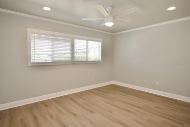 One or more photo(s) has been virtually staged. NO SHOES....NO on Gulf Harbors Golf Course in Florida - for sale on GolfHomes.com, golf home, golf lot