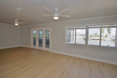One or more photo(s) has been virtually staged. NO SHOES....NO on Gulf Harbors Golf Course in Florida - for sale on GolfHomes.com, golf home, golf lot