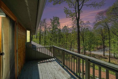 Perched at the crest of a wooded hill, this distinctive on Birchwood Farms Golf and Country Club in Michigan - for sale on GolfHomes.com, golf home, golf lot