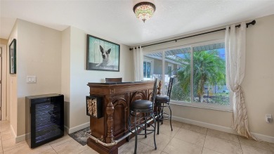 This property offers an ASSUMABLE VA loan for qualified buyers! on Sorrento Par 3 in Florida - for sale on GolfHomes.com, golf home, golf lot