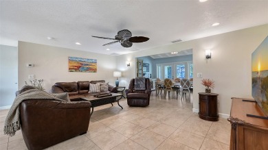 This property offers an ASSUMABLE VA loan for qualified buyers! on Sorrento Par 3 in Florida - for sale on GolfHomes.com, golf home, golf lot