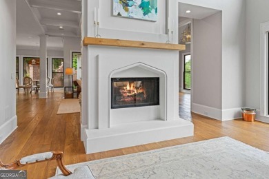 Tucked into a quiet cul-de-sac within one of Suwanee's most on Laurel Springs Golf Club in Georgia - for sale on GolfHomes.com, golf home, golf lot