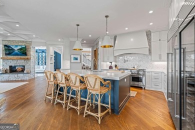 Tucked into a quiet cul-de-sac within one of Suwanee's most on Laurel Springs Golf Club in Georgia - for sale on GolfHomes.com, golf home, golf lot