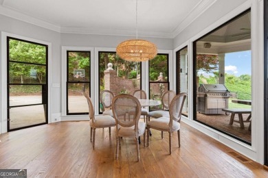 Tucked into a quiet cul-de-sac within one of Suwanee's most on Laurel Springs Golf Club in Georgia - for sale on GolfHomes.com, golf home, golf lot