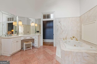 Tucked into a quiet cul-de-sac within one of Suwanee's most on Laurel Springs Golf Club in Georgia - for sale on GolfHomes.com, golf home, golf lot