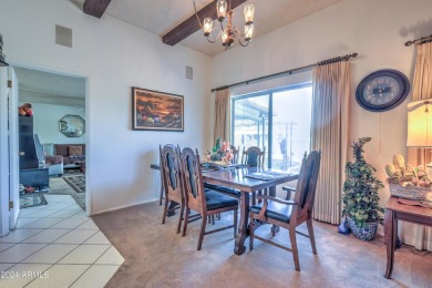 This Sun City home is delightful! Its spacious layout and large on PalmBrook Country Club in Arizona - for sale on GolfHomes.com, golf home, golf lot