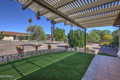 This Sun City home is delightful! Its spacious layout and large on PalmBrook Country Club in Arizona - for sale on GolfHomes.com, golf home, golf lot