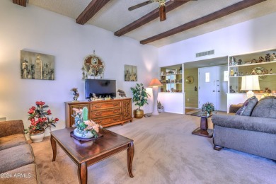 This Sun City home is delightful! Its spacious layout and large on PalmBrook Country Club in Arizona - for sale on GolfHomes.com, golf home, golf lot