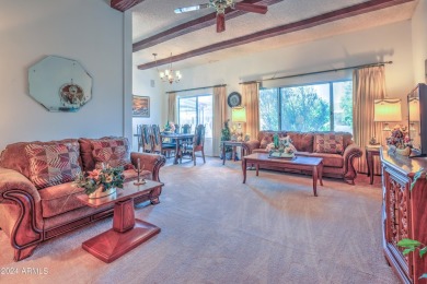 This Sun City home is delightful! Its spacious layout and large on PalmBrook Country Club in Arizona - for sale on GolfHomes.com, golf home, golf lot