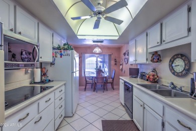 This Sun City home is delightful! Its spacious layout and large on PalmBrook Country Club in Arizona - for sale on GolfHomes.com, golf home, golf lot