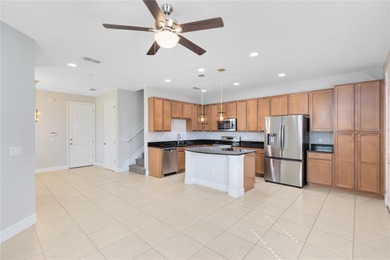 Welcome to this spacious end-unit townhome in the guard-gated on Eagle Creek Golf Club in Florida - for sale on GolfHomes.com, golf home, golf lot