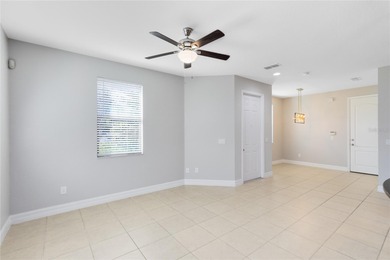 Welcome to this spacious end-unit townhome in the guard-gated on Eagle Creek Golf Club in Florida - for sale on GolfHomes.com, golf home, golf lot