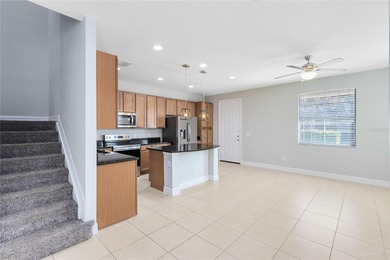 Welcome to this spacious end-unit townhome in the guard-gated on Eagle Creek Golf Club in Florida - for sale on GolfHomes.com, golf home, golf lot