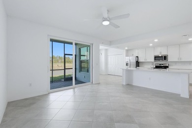 GOLF MEMBERSHIP INCLUDED + WATER & GOLF VIEWS -- First-floor on Myakka Pines Golf Club in Florida - for sale on GolfHomes.com, golf home, golf lot