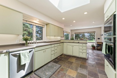 Enjoy single-level living and gorgeous natural light in this on Rivers Edge Golf Resort in Oregon - for sale on GolfHomes.com, golf home, golf lot
